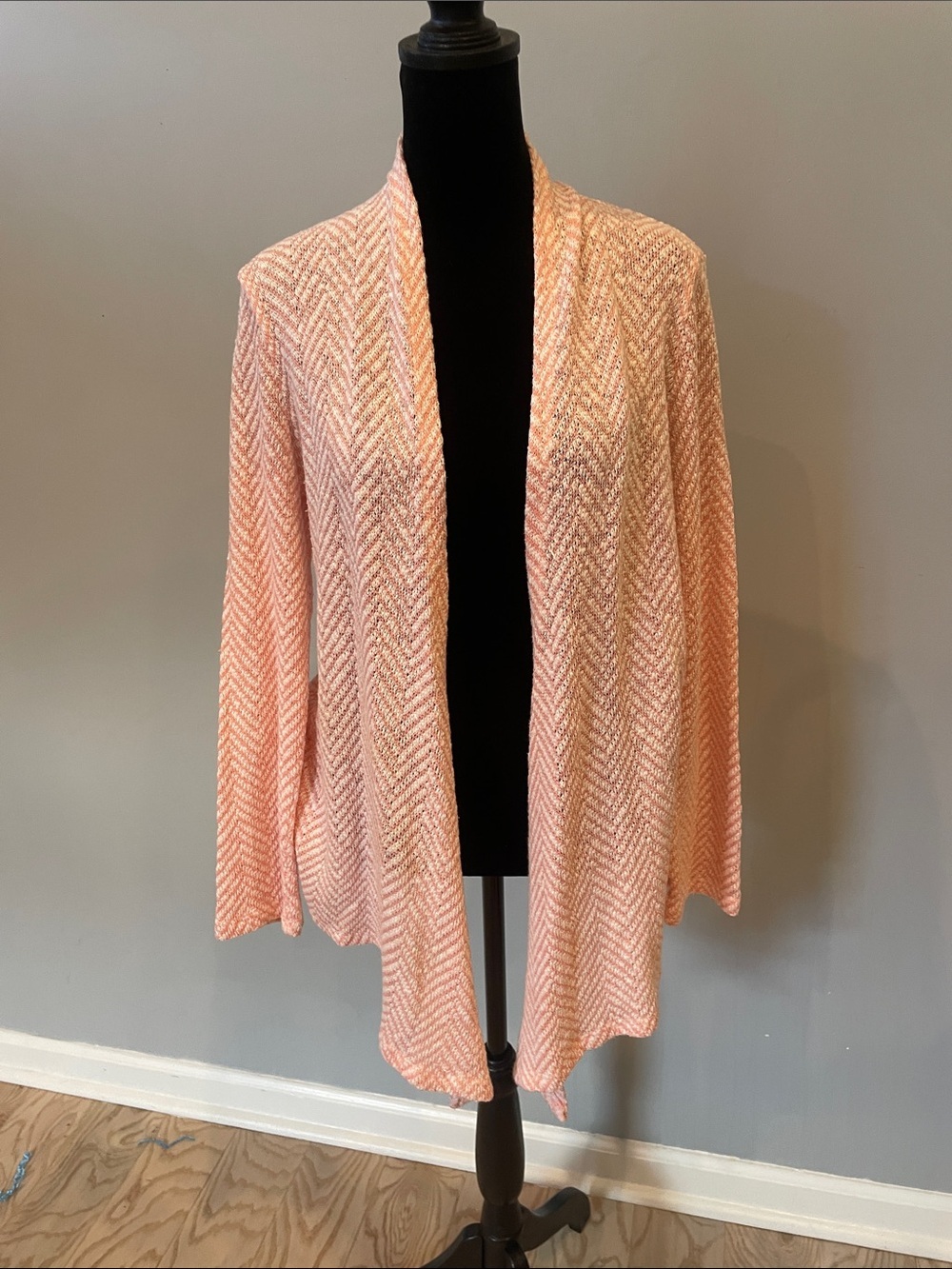 Baby pink and white open cardigan sweater